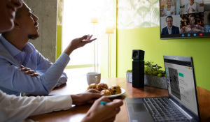 Boom Collaboration's BYOM solutions on full display in a small conference room with Boom UNO all-in-one videobar